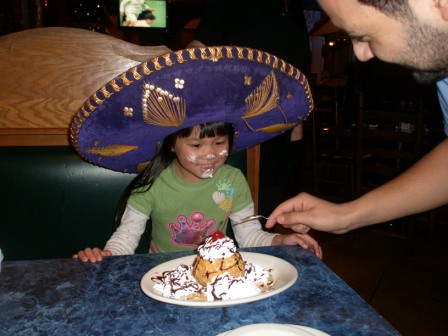 Kasen getting a birthday desert at the Mexican restaurant